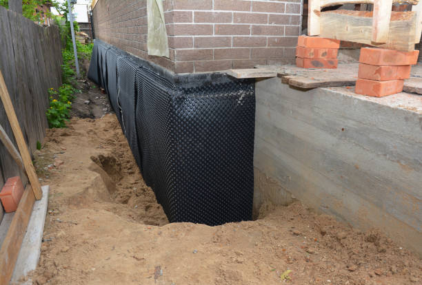 SJ Waterproofing Pros technician performing targeted Waterproofing assessment in Plymouth, IN